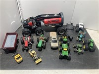 Lot of toy tractors and trucks