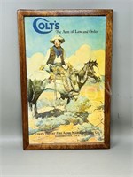 Wood framed "Colts firearms" advertisement