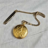 wind up pocket watch with knife (does work)