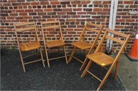 A set of $ Vintage Folding Chairs marked H. Lee