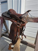 Pony saddle with blanket and horse tack