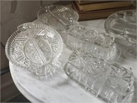 Clear glass servers, butter dishes