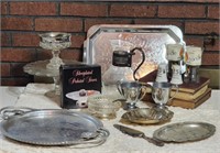 Silver serving pieces. Cake stand