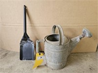 Galvanized watering can and coal shovel