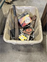 Clothes basket with machete and misc items