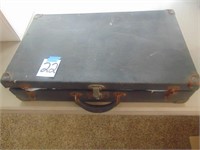 Vintage trunk with baby clothes