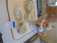 tea cups, pitcher,  small German serving dish