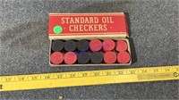 Standard Oil checkers pieces