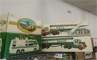 Four vintage Hess trucks