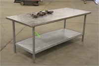 Stainless Steel Table Approx 6ftx30"x30" on Wheels