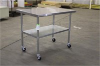 Stainless Steel Table Approx 4ftx30"x39" on Wheels