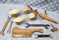 Antique Cadillac and Ford wrenches, skates,