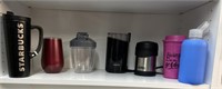 Cups and coffee grinder
