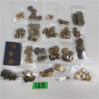 Bag of pins/buttons including Air Canada buttons