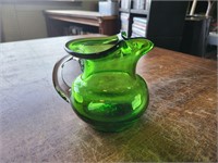 Handblown glass pitcher