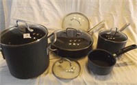 9 pcs Calphalon cookware-- lids, pots, skillets