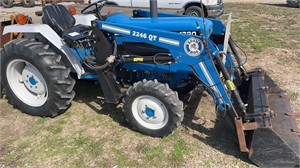 NEW HOLLAND 1720 with BUSH HOG 2246 loader