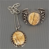 Navajo silver cuff bracelet and pendent necklace