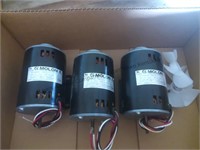 Three electric motors with two fan blades see