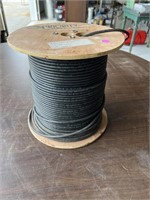 Partial roll of conduit cable