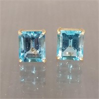 Pair of 14k gold earrings set with topaz