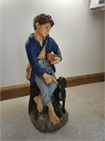 Statue of Boy w/ dog. Marked Holland.