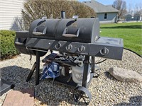 Oklahoma Joe's smoker/gas grill. Comes w/ cover.