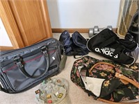 4 Duffel Bags and 4 hand weight barbells.