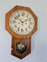 Howard Miller wall clock w/ chimes. Functional