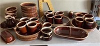 Large lot of brown drip pottery