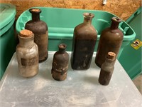 Antique assorted bottles