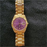 Gold Geneva Watch