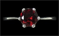 Sterling silver round cut garnet solitaire ring in