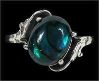 Sterling silver claw set blue paua ring in bypass