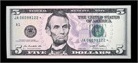 $5 Federal Reserve star note, series of 2009, Unc.