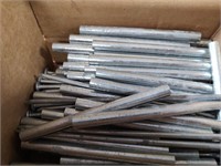 Box of Aluminum Tubes and Huge Nails