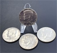 Four 1967 JFK Half Dollars