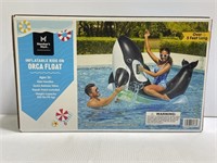 Inflatable ride on orca float