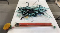 Plastic & wire hangers w/ supply tube & hose brush