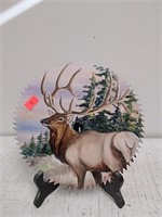 Bull elk painting on 7-in saw blade