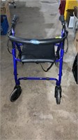 Invacare walker with seat.