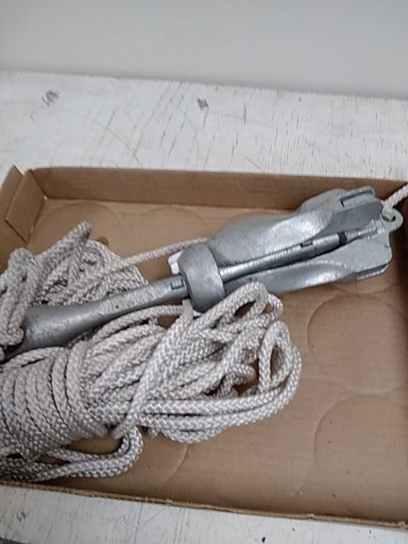 Small boat anchor with rope