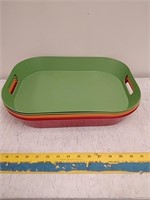 Group of plastic serving trays
