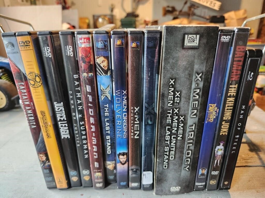 DVD'S. X-Men. Justice League. Rack not included