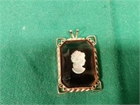 Amethyst glass cameo pendant.