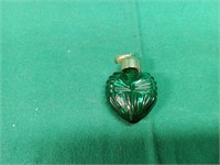 Emerald glass perfume pendant.
