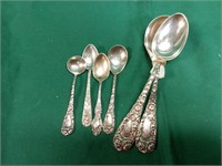 Sterling silver ornate spoons approximately