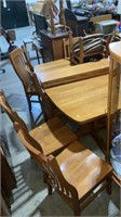 Kitchen table with 6 chairs, and 4 extra leafs