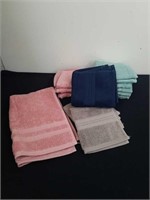 13 new 13x13-in washcloths and one hand towel