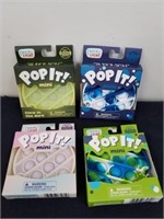 Four new pop it minis, one is glow in the dark